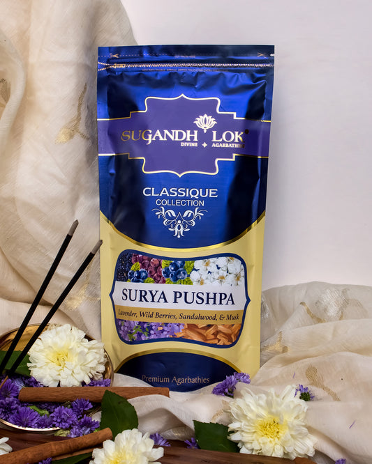 Front of Surya Pushpa Agarbatti Pouch surrounded by flowers