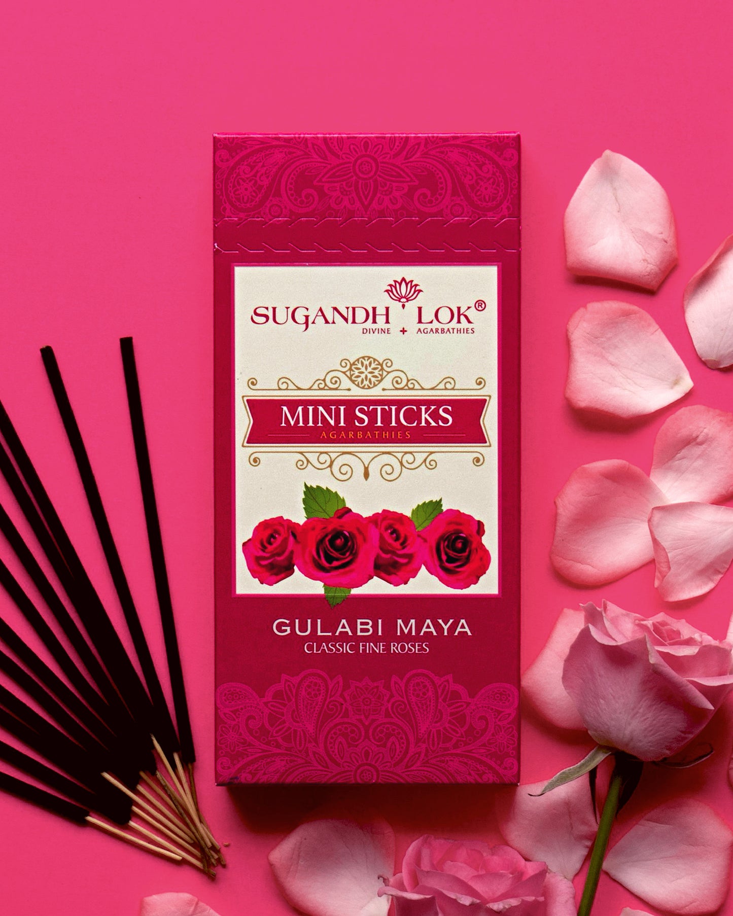 Gulabi Maya Agarbatti Mini Sticks Box surrounded by rose petals
