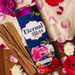 Eternal Bliss Agarbatti Pack surrounded by flowers and petals