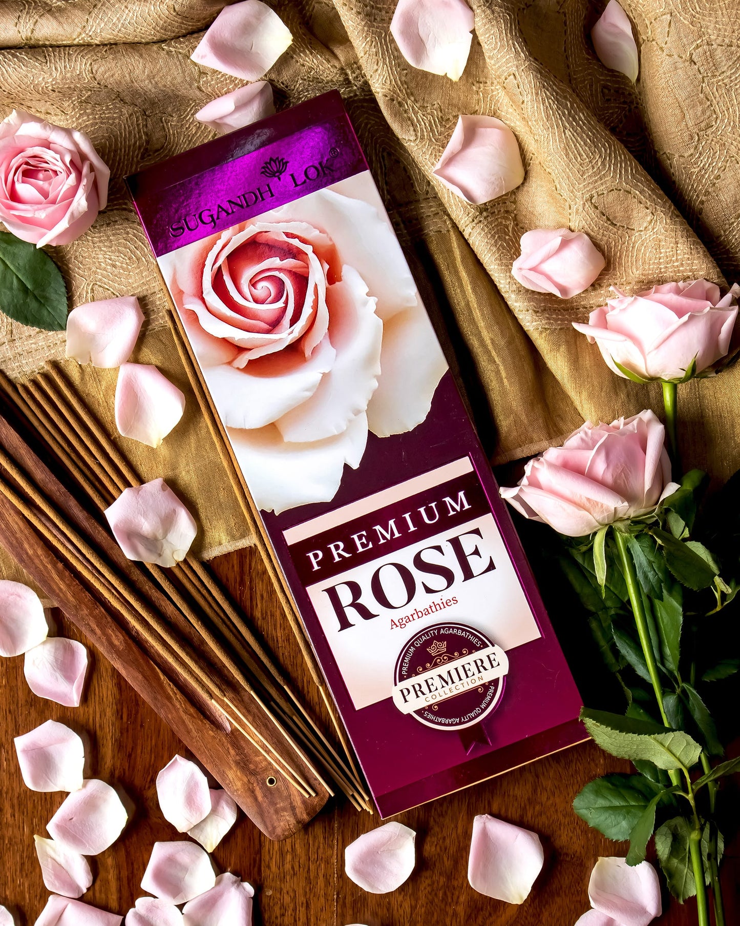 Premium Rose Agarbatti Pack surrounded by pink roses & petals
