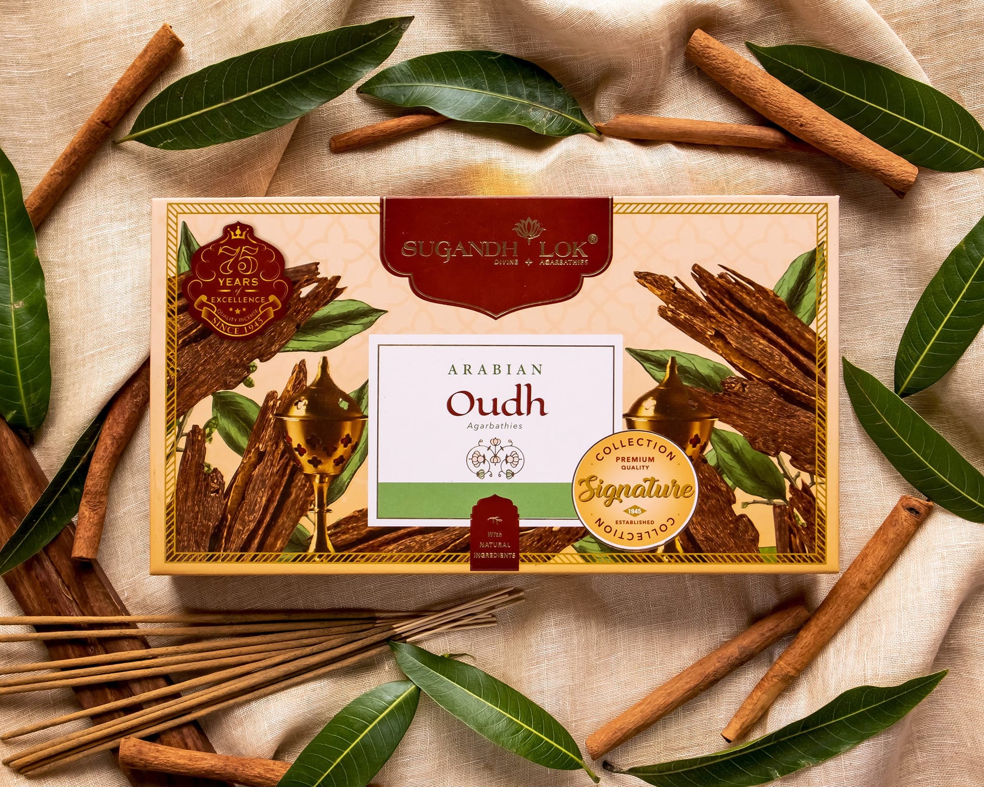 Arabian Oudh Agarbatti Box surrounded by oudh and leaves