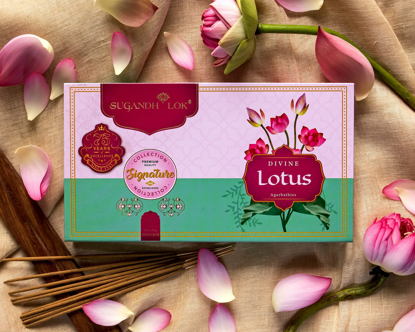 Divine Lotus Agarbatti Box surrounded by lotus flowers and lotus petals