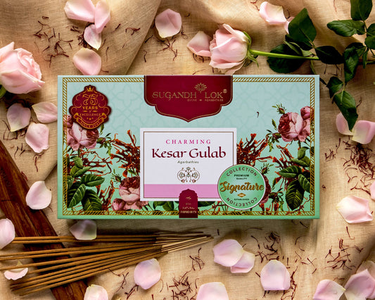 Charming Kesar Gulab Agarbatti Box surrounded by kesar and rose petals