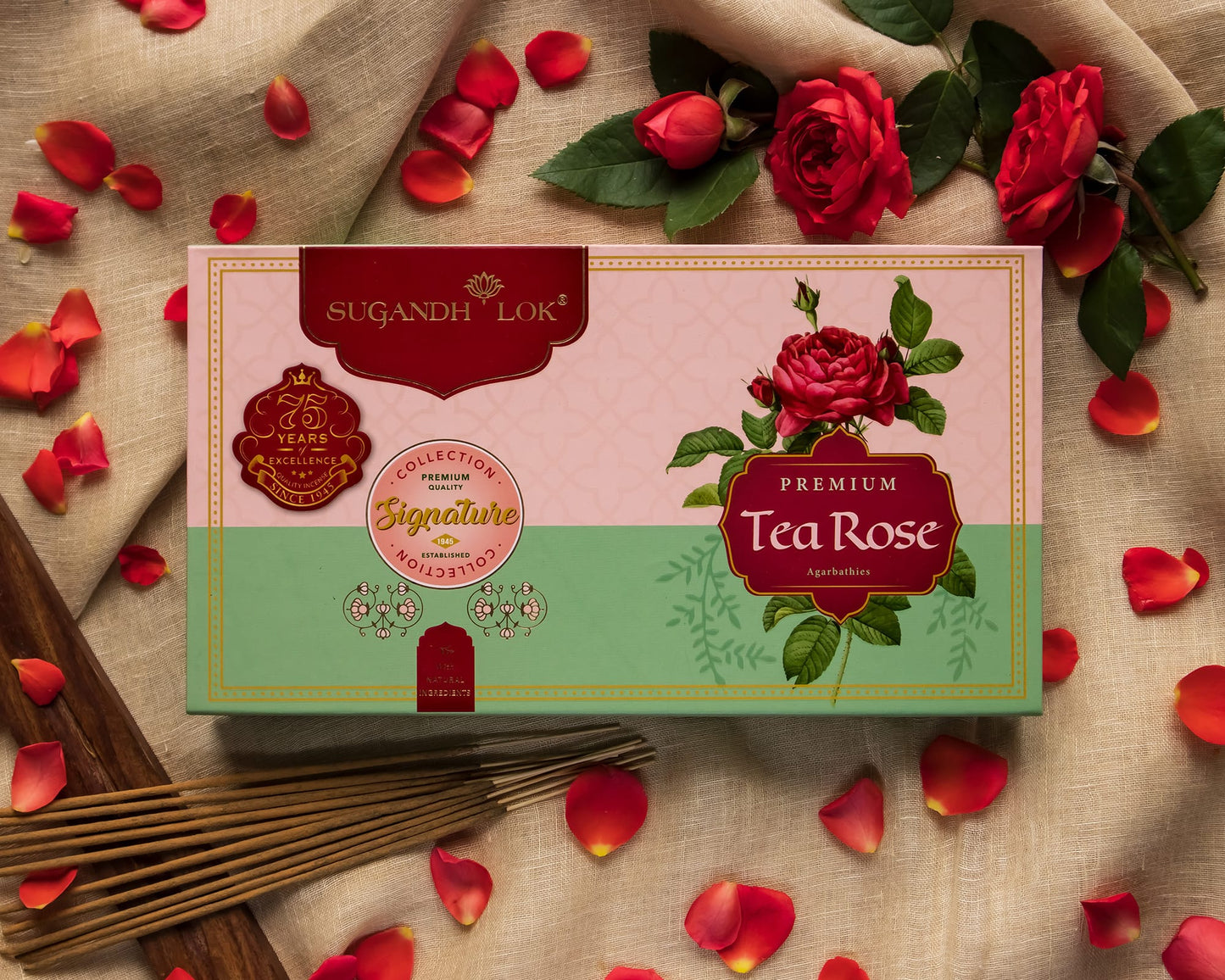 Premium Tea Rose Agarbatti Box surrounded by rose flowers, petals & incense sticks