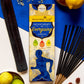 Energising Agarbatti Pack surrounded by citrus fruits and incense sticks