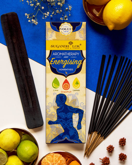 Energising Agarbatti Pack surrounded by citrus fruits and incense sticks