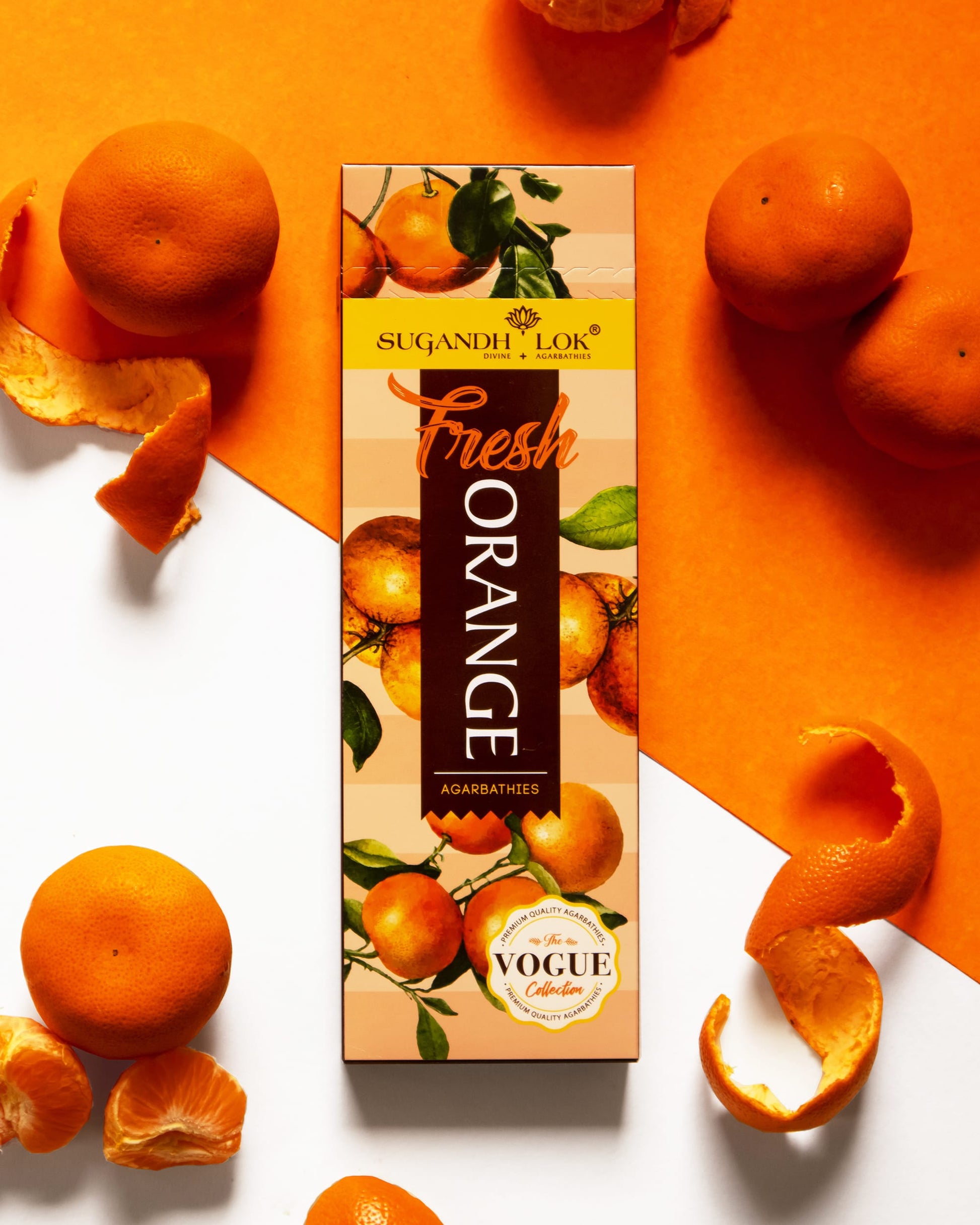 Fresh Orange Agarbatti Box surrounded by oranges