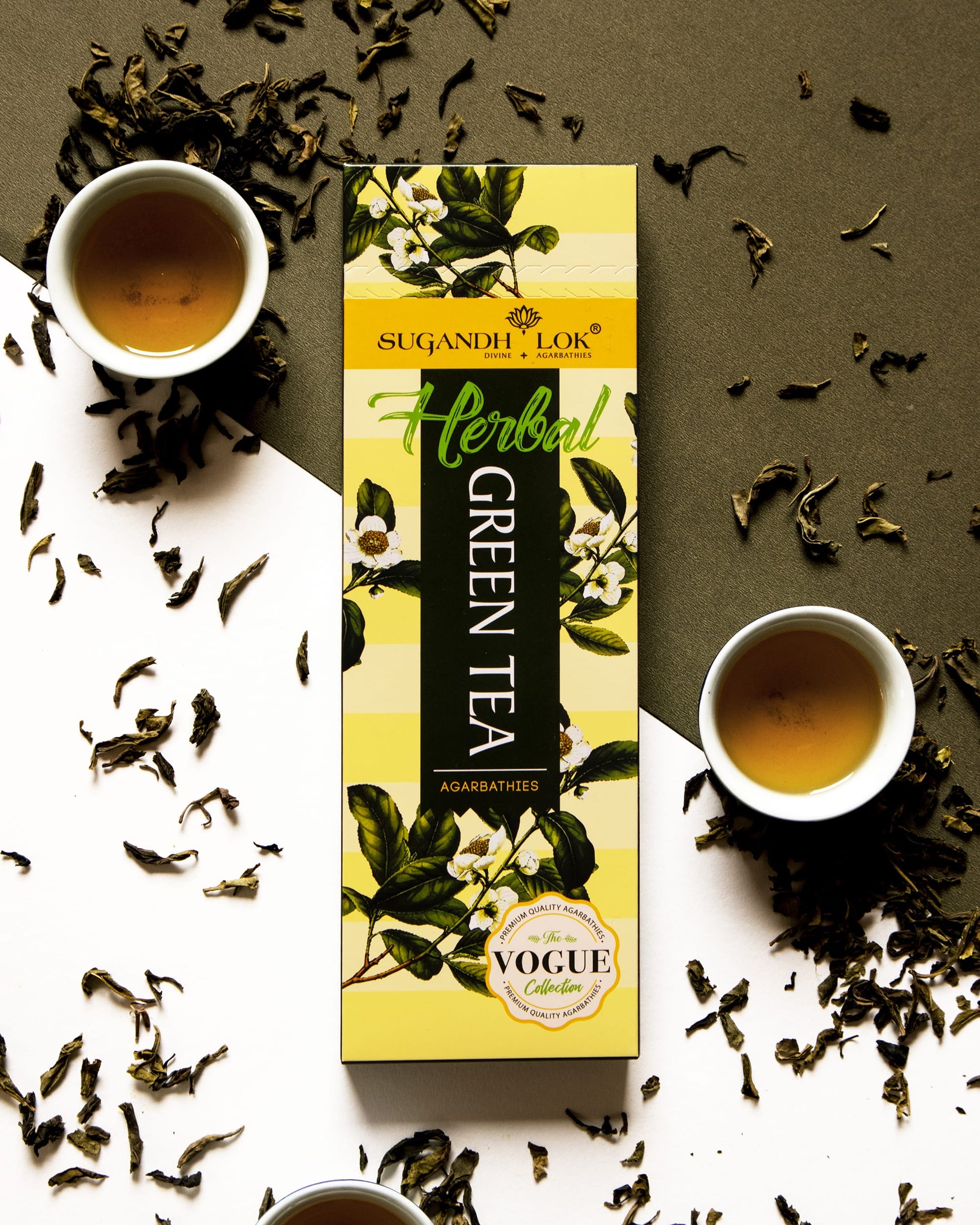Herbal Green Tea Agarbatti Box surrounded by herbs & herbal tea in cups